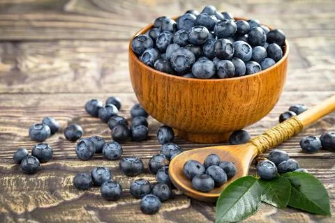 Blueberry on old background Stock Photos