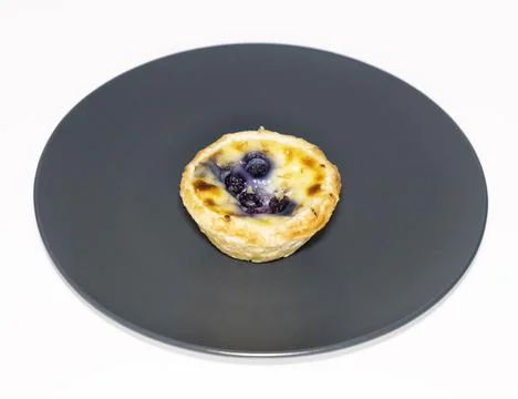 Blueberry pasteis de nata Stock Photos