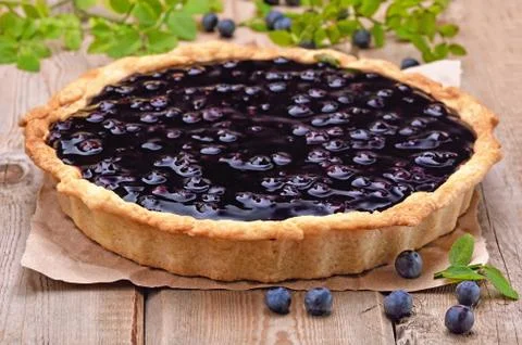Blueberry pie on rustic table 스톡 사진