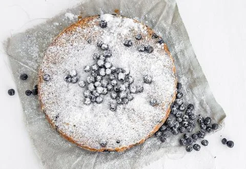Blueberry pie on a white surface Stock Photos
