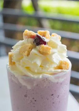 Blueberry smoothie drinking Stock Photos