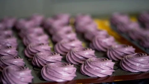 Blueberry zephyr drying on table in kitchen indoors. Aerial marshmallow  Stock Footage 78034080