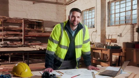 Blueprint, architecture and face with man in workshop for site plan scale, Stock Footage 338046736