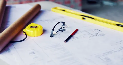 Blueprint, architecture and planning on construction site for building safety or Stock Footage 336777703
