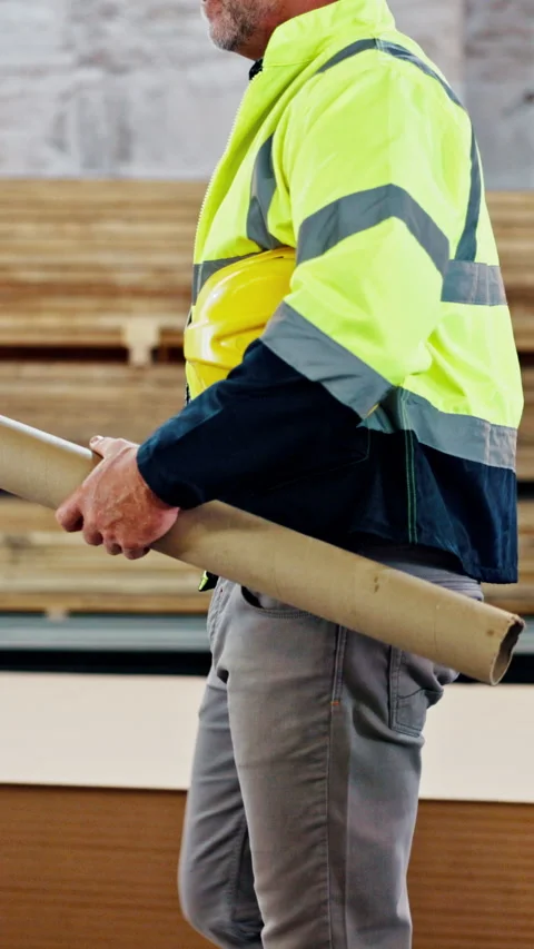 Blueprint, construction and walking with man in workshop for architecture or Stock Footage 340451417