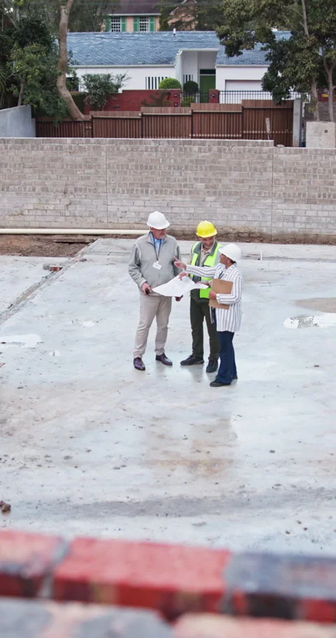 Blueprint, development or planning with engineer team outdoor for inspection Stock Footage 340959442