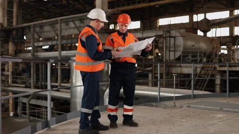 Blueprint discussion, Structural study, Factory sketch Stock-Footage 261040039