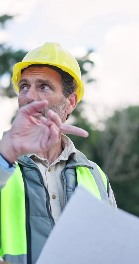 Blueprint, man and planning with engineer team outdoor for engineering Stock Footage 340960202