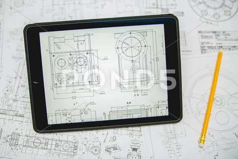 The blueprints engineering for the project near tablet (ipod) and pencil Stock Photos