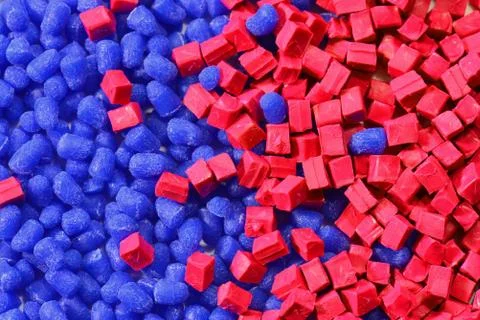 Blue/red polymer granulate Stock Photos