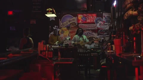 Blues singer plays in bar Stock Footage 142845590