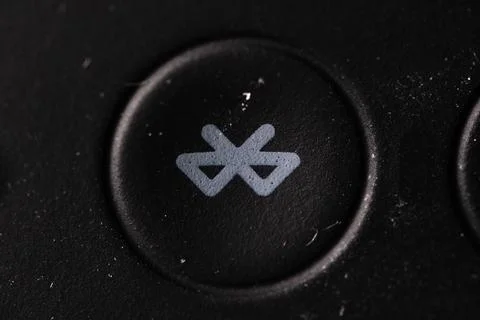 Bluetooth button on black Stock Photos