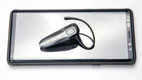 Bluetooth close up with a mobile phone. digital technology of mobile devices  Stock Photos