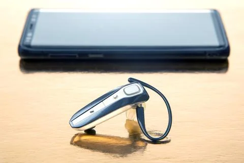 Bluetooth close up with a mobile phone. digital technology of mobile device.. Stock Photos