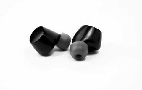 Bluetooth Earbuds on White Background Stock Photos