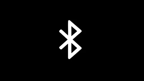 Bluetooth icon appearing and disappearing animation on black background Stock Footage 319768621
