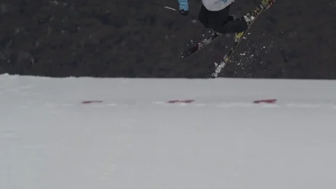 Blue/white skiier performs another jump. Stock Footage 81882410