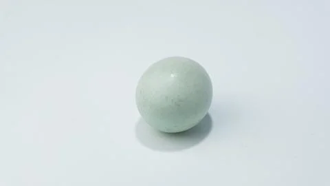 Bluish colored raw duck egg isolated on white background Stock Photos