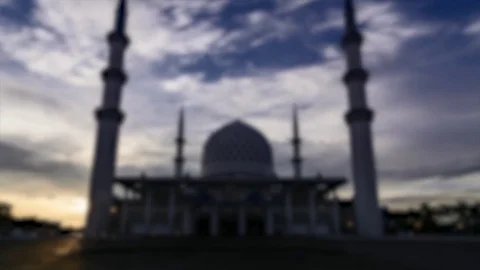 Blur 4k Time lapse footage of a sunset scene of Shah Alam Mosque Stock Footage 81096017