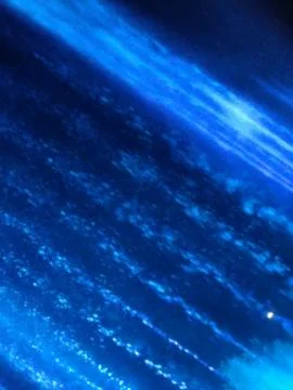 Blur, abstract background, diagonal flowing shades of blue, azure, black. Bok Stock Photos