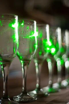 Blur abstract background interior of dark brown bar. Empty glasses for wine Foto stock