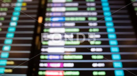 Blur of Arrivals and departure board at nternational air port. Stock Photos