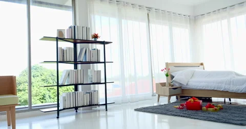 Blur background bedroom home interior in cozy decoration room. Clean soft bed st Stock Footage 246262108