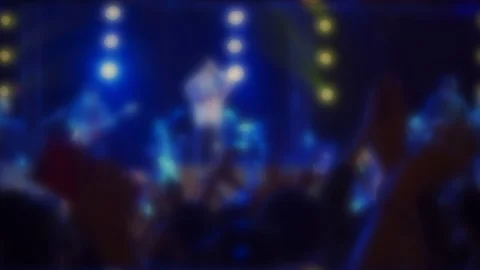 Blur background of colored lights from the stage at a live music festival at  Stock Footage 122585921