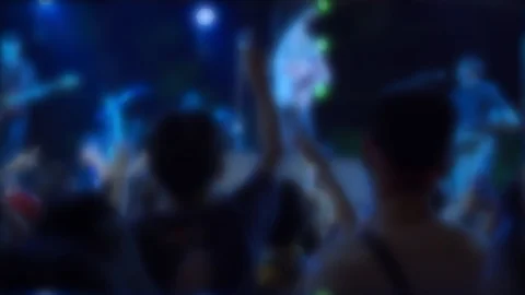 Blur background of colored lights from the stage at a live music festival at  Stock Footage 122585931