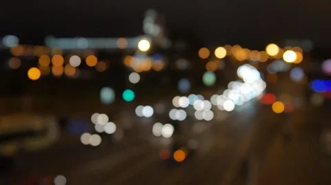 Blur background. Moving bokeh circles of night traffic. Defocused night traffic Stock Footage 68912755