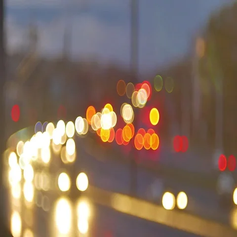 Blur background. Moving bokeh circles of night traffic. Defocused night traffic Stock Footage 69380784