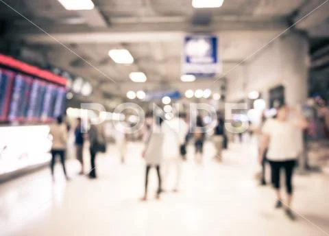Blur background : People at departure and arrivals electronic schedule board Stock Photos