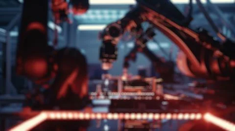 Blur background of robot machine working together at production line. Spate. Stock Photos