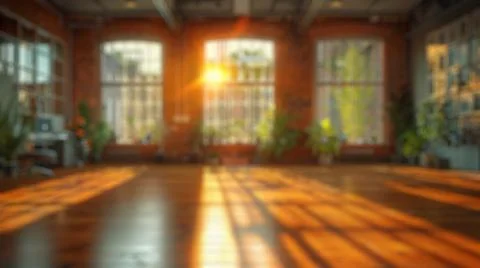 Blur background of spacious office with exposed brick wall and windows. Spate. Fotos Stock