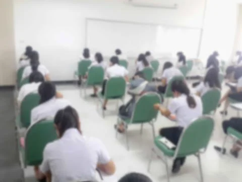Blur background students were taking an exam in college. Stock Photos