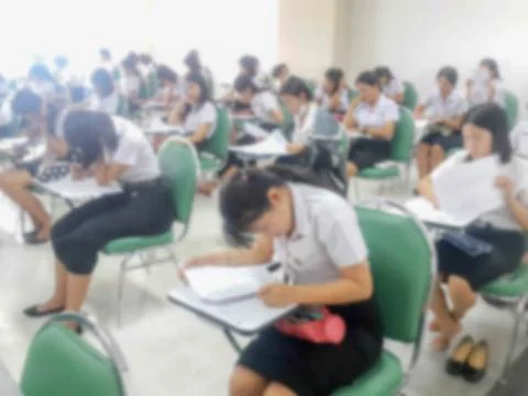 Blur background students were taking an exam in college. Stock Photos