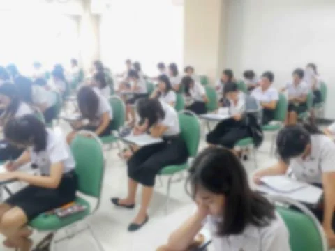 Blur background students were taking an exam in college. Stock Photos