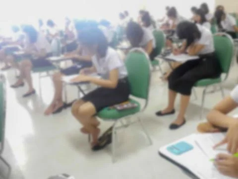 Blur background students were taking an exam in college. Stock Photos