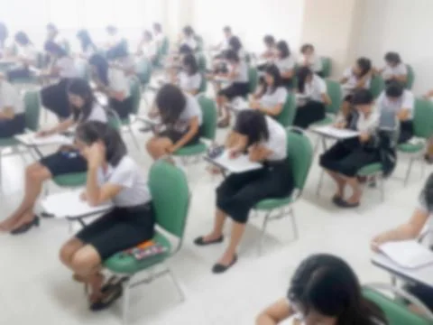 Blur background students were taking an exam in college. Stock Photos