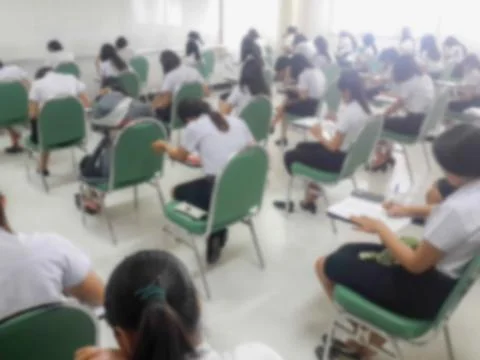 Blur background students were taking an exam in college. Stock Photos