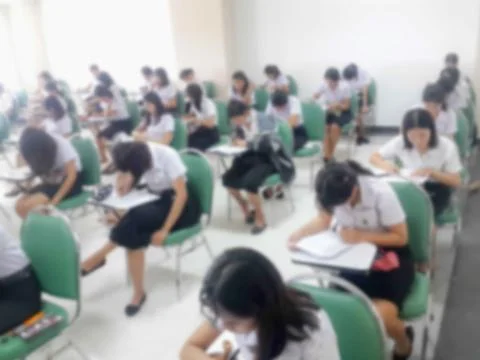 Blur background students were taking an exam in college. Stock Photos