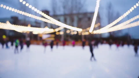 Blur background. Winter skating rink on the street. New Year and Christmas Stock Footage 142625022
