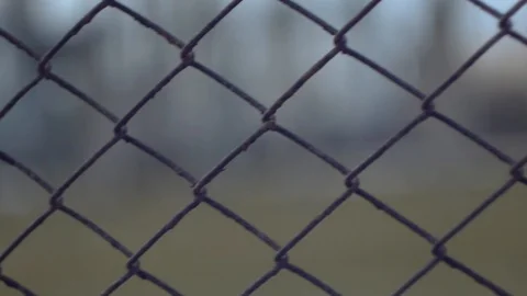 Blur behind the fence Stock Footage 123070642