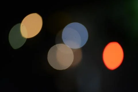 Blur bokeh. Blurry multicolor light from the lamp. Stock Photos