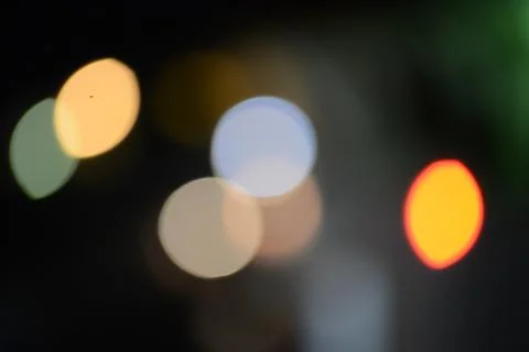 Blur bokeh. Blurry multicolor light from the lamp. Stock Photos