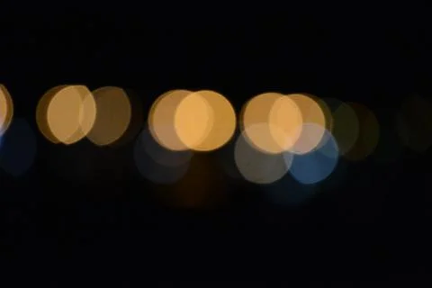 Blur bokeh. Blurry multicolor light from the lamp in the distance Stock Photos