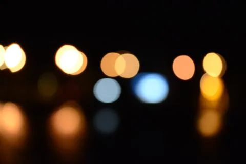 Blur bokeh. Blurry multicolor light from the lamp in the distance Stock Photos