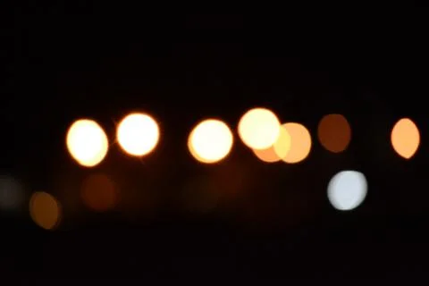 Blur bokeh. Blurry multicolor light from the lamp in the distance Stock Photos