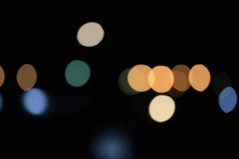 Blur bokeh. Blurry multicolor light from the lamp in the distance Stock Photos