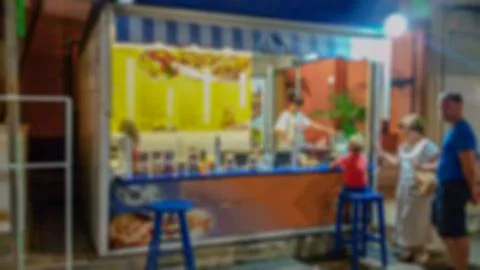 Blur with bokeh elements in the creative story on the topic of fast food. Pho Stock Photos